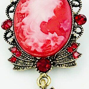 RED CAMEO BROOCH  / PENDANT RED CRYSTALS AND A DANGLE ON THE BOTTOM